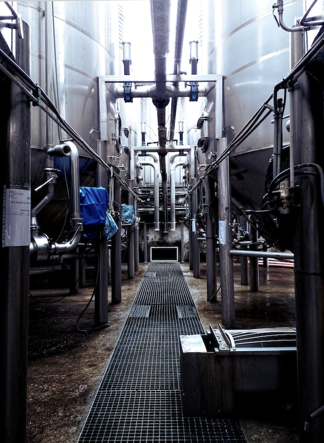 View of piping from inside of a factory 